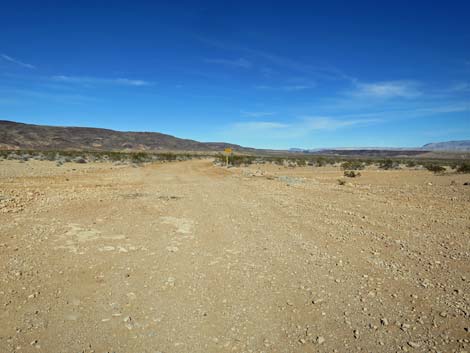 Approaching backside of Primitive Road sign (view S)